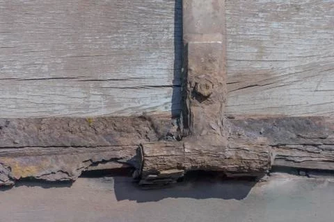 Old hinges rust and nut on old wood Stock Photos