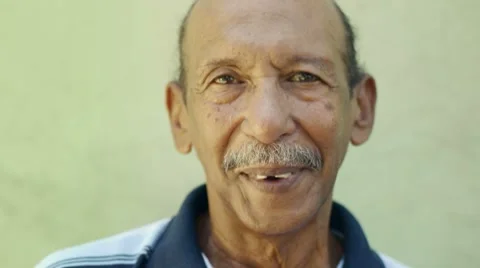 Old hispanic man smiling at camera Stock Footage 7736456