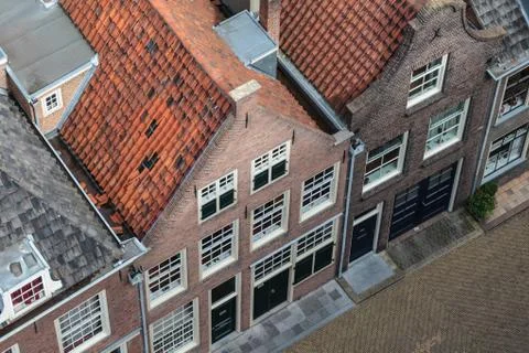 Old historic houses in the dutch town delft Stock Photos