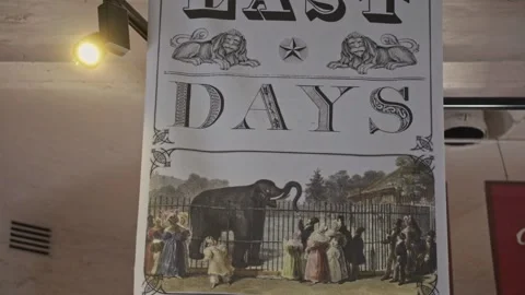 Old historical poster chart saying "Last Days" and showing an elephant Stock Footage 217315785