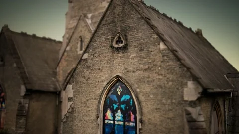 Old holbeach cemetry stone chapel Stock Footage 138923754