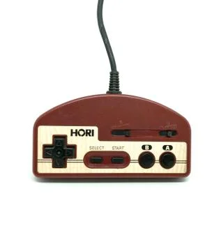 Old Hori Controller isolated on white background. Stock Photos