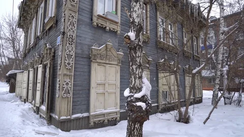 Old house corner. Unique authentic Russian style wood carving architecture. Irku Stock Footage 88464464