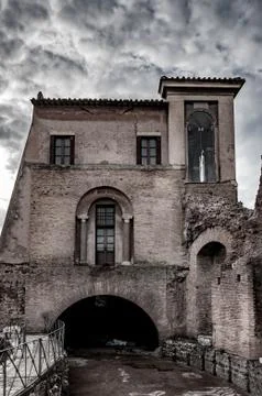 Old house with dramatic sky on teh background Stock Photos