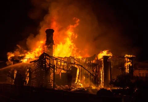 Old house fire Stock Photos