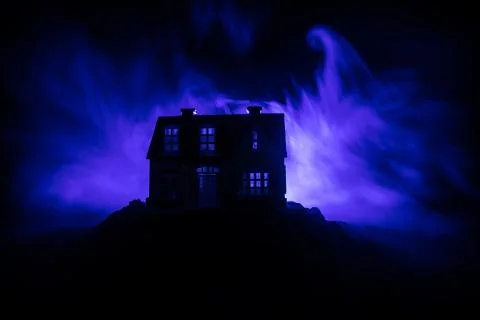 Old house with a Ghost in the forest at night or Abandoned Haunted Horror Hou Stock Photos