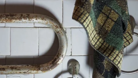 Old house interior rusty pipes in the bathroom Stock Footage 69177944
