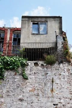 Old house with one window. Stock Photos