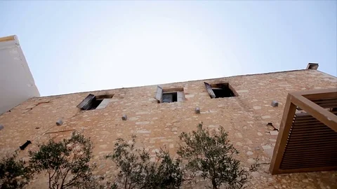Old house with open windows against the blue sky 動画素材 85233496