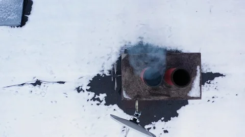 Old house in Poland with multiple chimneys producing smog Stock Footage 100792187