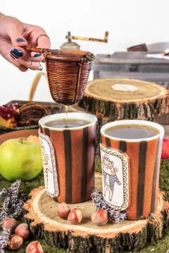 Old house table set with tea cups and strainer Stock Photos