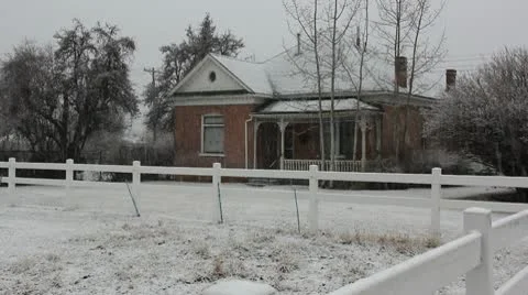 Old house while snowing Stock Footage 10750725