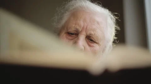 Old human reading a book. Close up Stock Footage 43645218