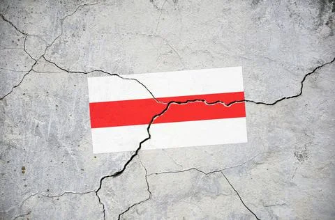 An old image of the flag of Belarus on a wall with a crack. Stock Photos