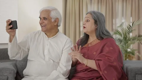 Old Indian couple making a vlog for soci... | Stock Video | Pond5