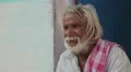 Old Indian man sitting in front of the door HD Footage