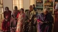 Old Indian women sitting down and reading in India HD Footage