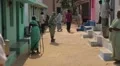 Old Indian women walking with a zimmer frame in India HD Footage