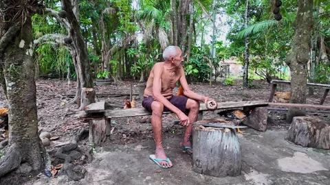 An old indigenous man in the Amazon rainforest at the Guama River, Belem, Brazil Stock Footage 312227334