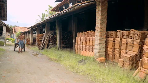 Old indonesian pulling cart with clay Stock Footage 87971705