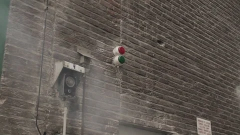 Old Industrial Intercom and Signal Lights on Brick Wall with Smoke Stock Footage 301509490