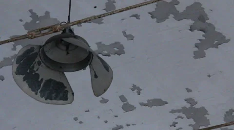 Old industrial lamp dangling from the ceiling Stock Footage 36933364