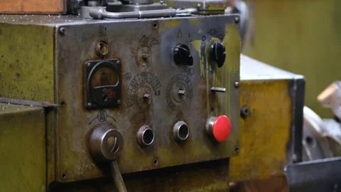 Old industrial machine control panel with knobs and buttons in metalworking.. Stock-Footage 333246258
