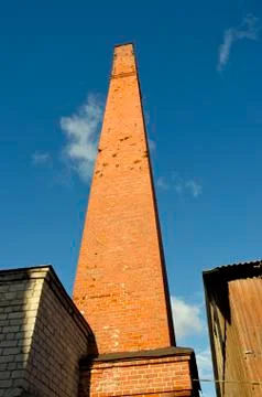 Old industrial red brick stack 写真素材