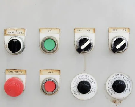 Old industrial switching button control panel Stock Photos