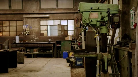 Old Industrial Workshop with Drill Press and Broken Windows Stock Footage 318605594
