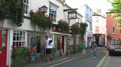 Old Inn with Hanging Baskets Stock Footage 18010651