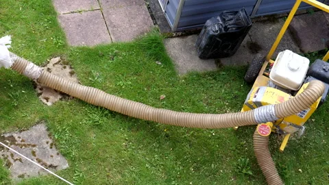 Old insulation suction machine, large sack and hose, top view. Stock Footage 291929677