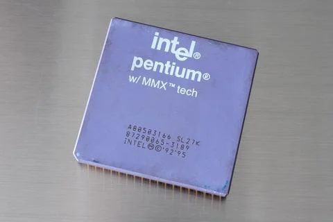 Old Intel processor on a gray background Stock Photos