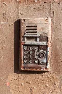 Old intercom smeared in paint Stock Photos