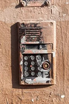 Old intercom smeared in paint Stock Photos
