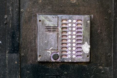 Old intercom smeared in paint 스톡 사진