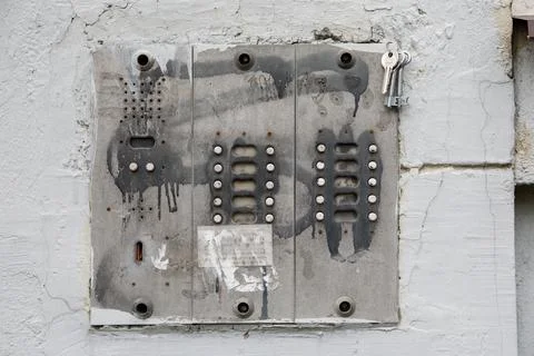 Old intercom smeared in paint Stock Photos