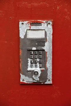 Old intercom smeared in paint Stock Photos