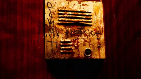 Old intercom. A very outdated communication radio hangs in the corner Stock Footage 194805856