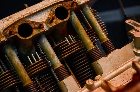 Old internal combustion engine of car with rust in workshop Stock Photos