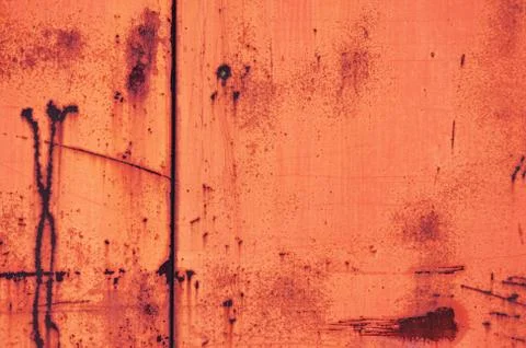 Old iron background painted in brown and blue with rust and chips. Stock Photos