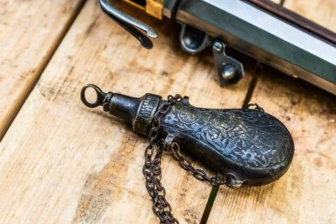 Old iron gunner with a pattern for storing gunpowder stock for weapon equippi Foto stock