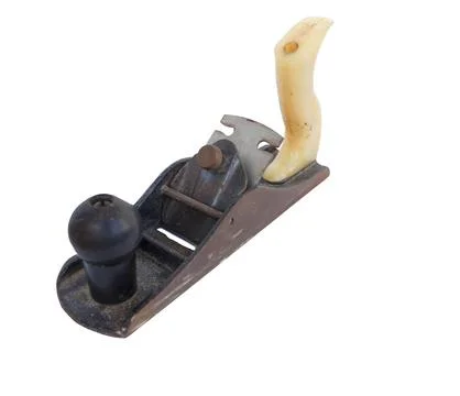 Old iron hand plane with plastic yellow back handle isolated on white backg.. Photos
