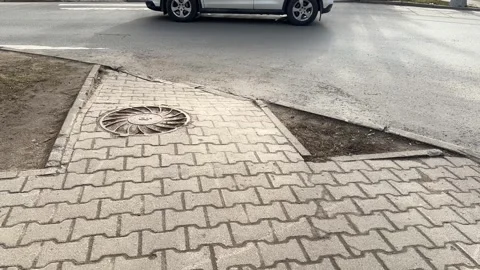 A old iron hatch with a pattern above an observation well is located on auto Stock Footage 274418645