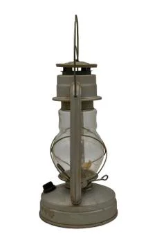 Old iron kerosene lamp. Isolate on a white background. Stock Photos