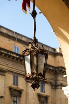Old iron lantern with patterns in the arch Stock Photos