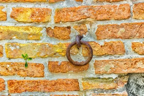 Old iron ring in a brick wall Stock Photos