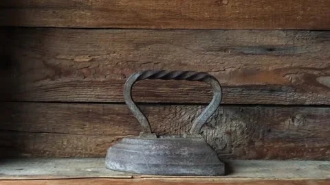 Old iron on a shelf Stock Footage 317647047