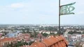 Old iron vane standing on the building roof, view on amazing Gdansk city, Poland HD Footage