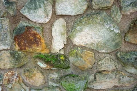 An old irregular garden wall  Stock Photos